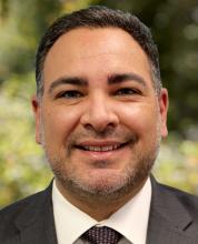 Carlos Orellana, District Counsel
