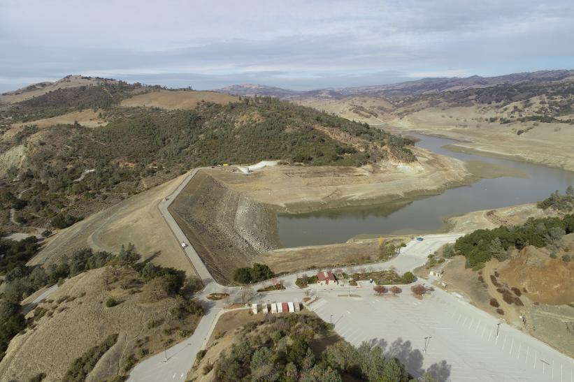 A photo of Anderson Reservoir, lowered to 3% of capacity.